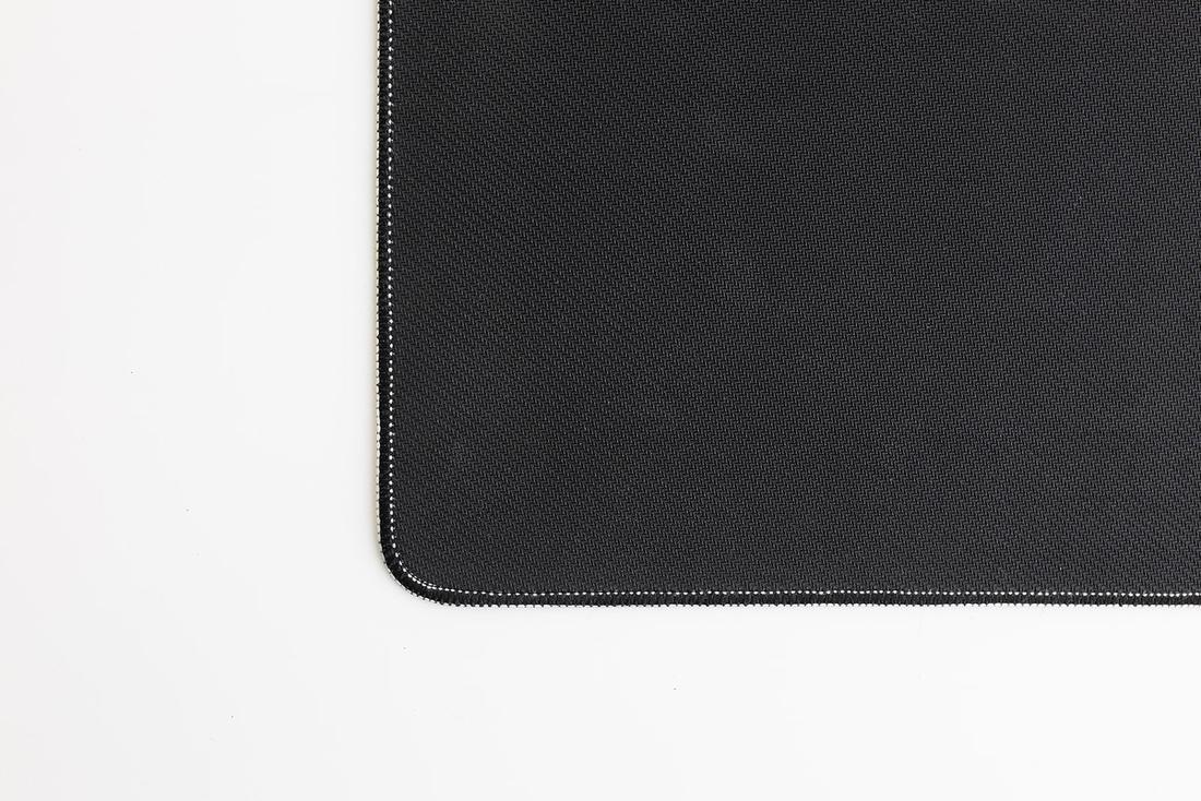Close-up of the anti-slip rubber base and stitched edge